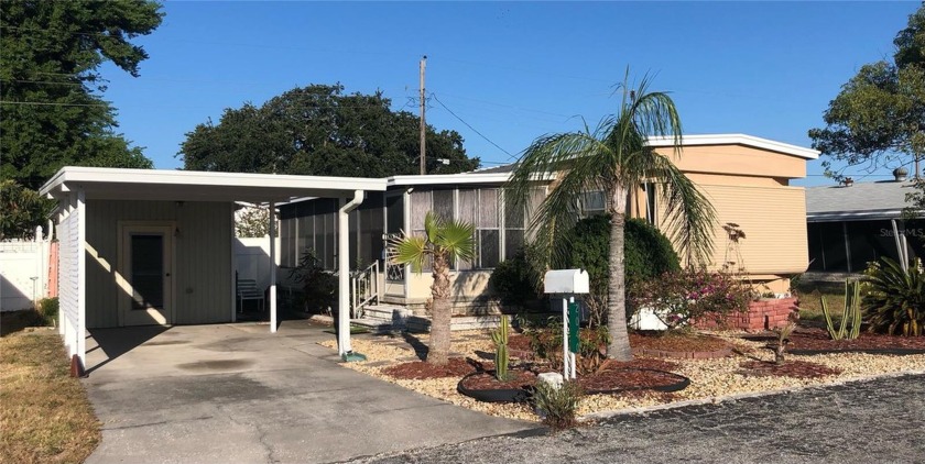Adorable 2 bedroom, 1 bathroom mobile home on .08 acres in the - Beach Home for sale in Holiday, Florida on Beachhouse.com