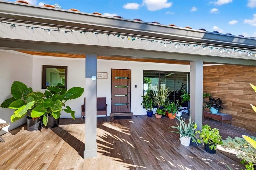 Exceptional opportunity to own a turnkey corner-lot home in - Beach Home for sale in Pompano Beach, Florida on Beachhouse.com