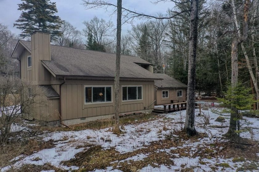 Set on one of the peninsula's most coveted and iconic roads - Beach Home for sale in Sturgeon Bay, Wisconsin on Beachhouse.com