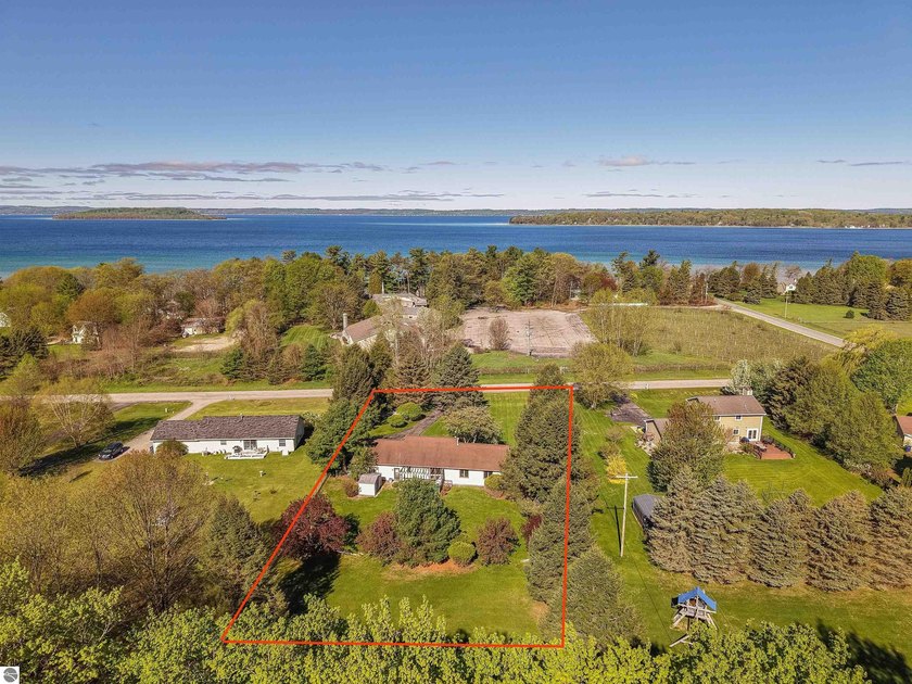 Tucked away on Old Mission Peninsula, this spacious ranch-style - Beach Home for sale in Traverse City, Michigan on Beachhouse.com