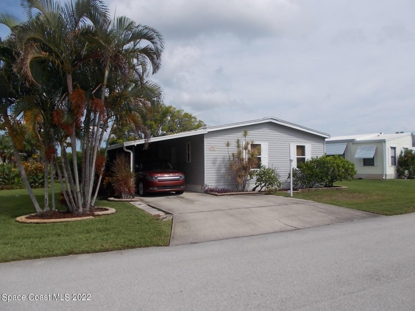 Lakefront Living. 2/2 with 2 car driveway . Upgrades include - Beach Home for sale in Micco, Florida on Beachhouse.com