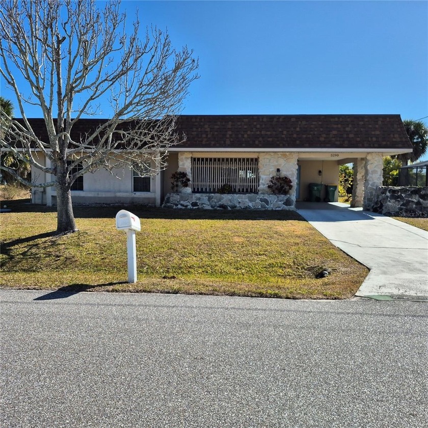 WAIT, WHAT???? WATERFRONT LIVING WITH DIRECT ACCESS TO THE - Beach Home for sale in Port Charlotte, Florida on Beachhouse.com