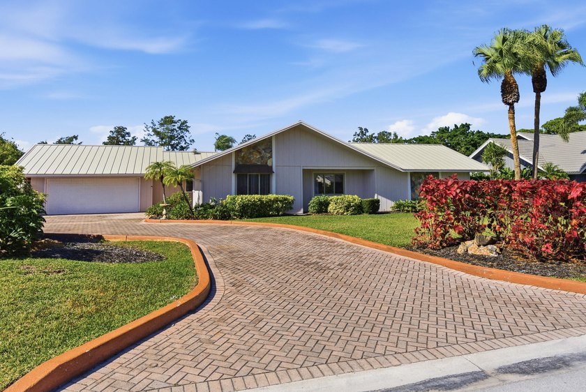 Enjoy serene golf-course views from this property, ideally - Beach Home for sale in Stuart, Florida on Beachhouse.com