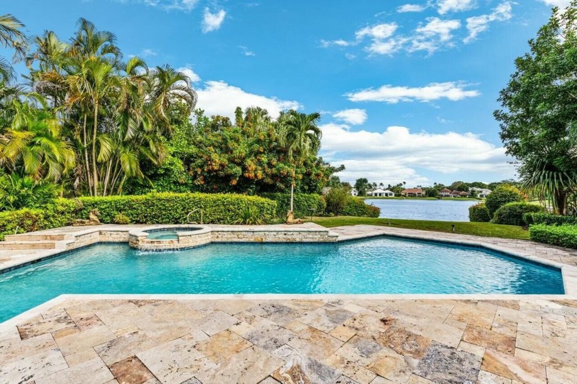 Amazing and stunning lake, pool and garden views are enjoyed - Beach Home for sale in Palm Beach Gardens, Florida on Beachhouse.com