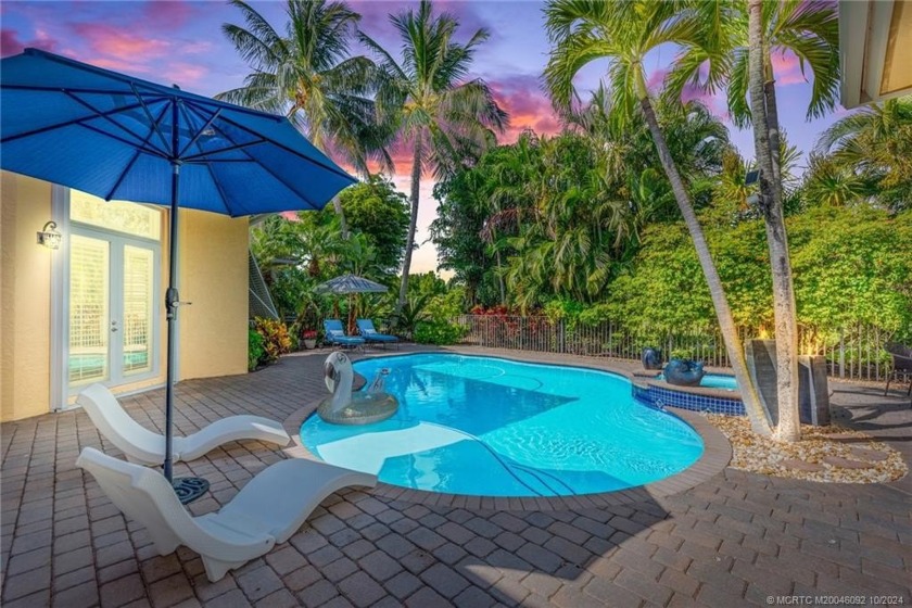 This 3BR/3BA/3CG + den home is a show stopper. Volume ceilings - Beach Home for sale in Palm City, Florida on Beachhouse.com