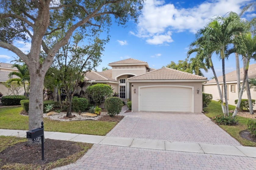 AMAZING WATERFRONT HOME | HIGHLY DESIRED VALENCIA SHORES | - Beach Home for sale in Lake Worth, Florida on Beachhouse.com