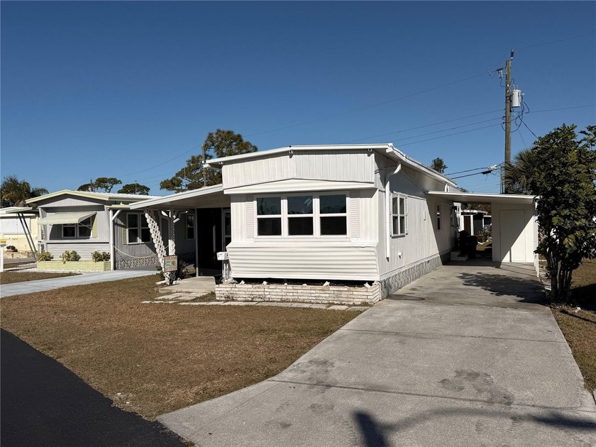 Welcome to Oak Grove, this nicely updated 2-bedroom, 1-bath home - Beach Home for sale in Englewood, Florida on Beachhouse.com