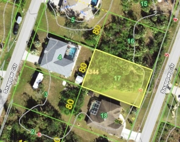 This 80' x 125' vacant lot is the standard size for the South - Beach Lot for sale in Port Charlotte, Florida on Beachhouse.com