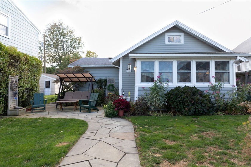 Welcome to the *Cozy Cottagea charming home nestled in the - Beach Home for sale in Rochester, New York on Beachhouse.com