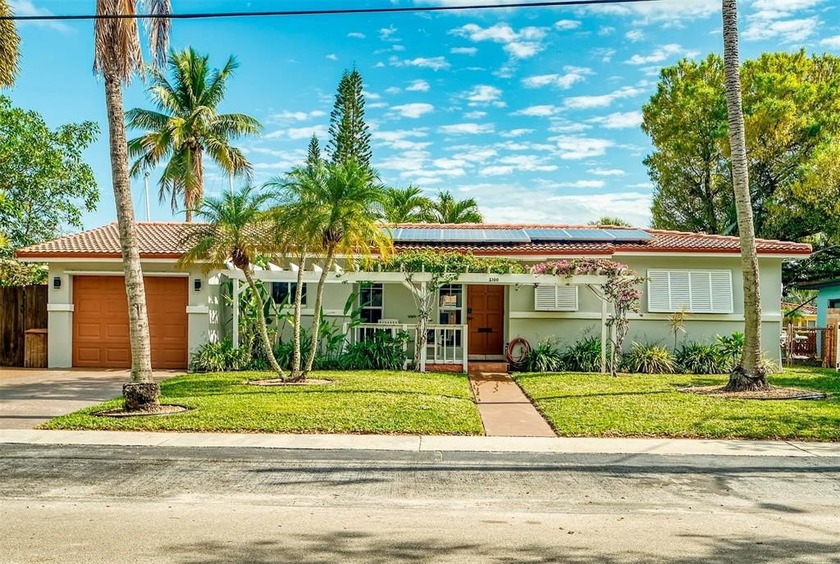 Enjoy 70 feet of waterfront in the highly desirable Flamingo - Beach Home for sale in Fort Lauderdale, Florida on Beachhouse.com