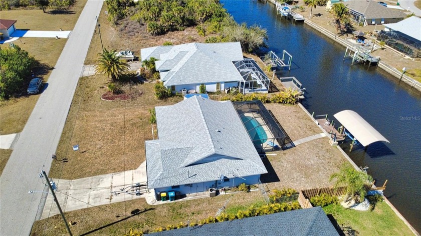 Waterfront living at its best! Boaters will truly appreciate the - Beach Home for sale in Port Charlotte, Florida on Beachhouse.com
