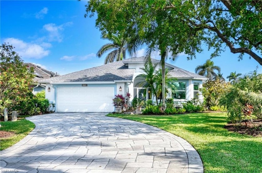 This very special Lakefront home sits facing South/East on a - Beach Home for sale in Naples, Florida on Beachhouse.com