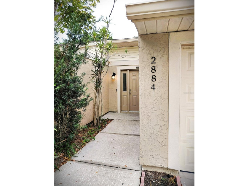 Don't miss this lovely open planned home in a great family - Beach Home for sale in Palm Harbor, Florida on Beachhouse.com