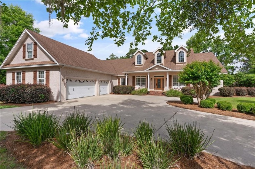 Discover serene outdoor living at 106 Majestic Drive on Oak - Beach Home for sale in Brunswick, Georgia on Beachhouse.com