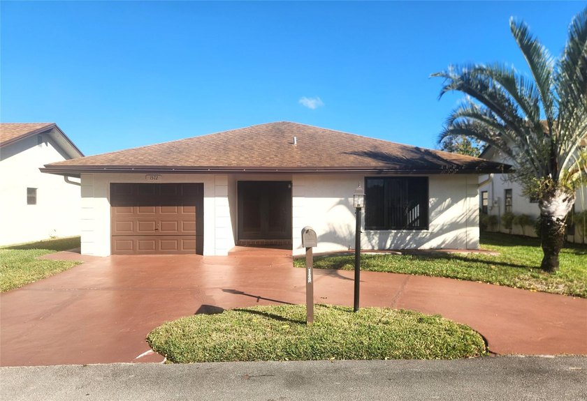 WELCOME HOME! UNIQUE HOME IN THE MEADOWS FEATURES NEW IMPACT - Beach Home for sale in Deerfield Beach, Florida on Beachhouse.com