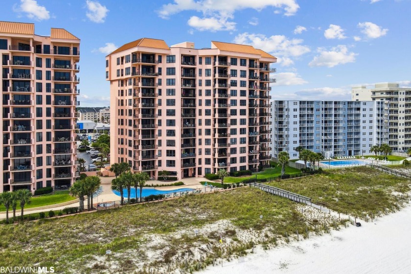 Welcome to 705E, your very own coastal oasis located at the - Beach Home for sale in Orange Beach, Alabama on Beachhouse.com