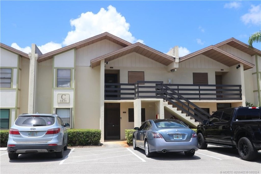 2nd floor condo with a beautiful view of the community pool area - Beach Condo for sale in Stuart, Florida on Beachhouse.com