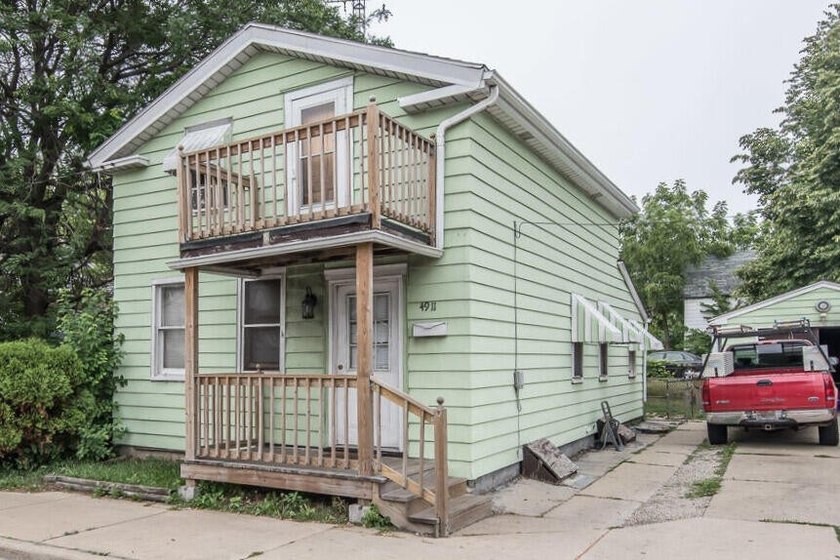 Welcome to this four-bedroom home offering a functional layout - Beach Home for sale in Kenosha, Wisconsin on Beachhouse.com