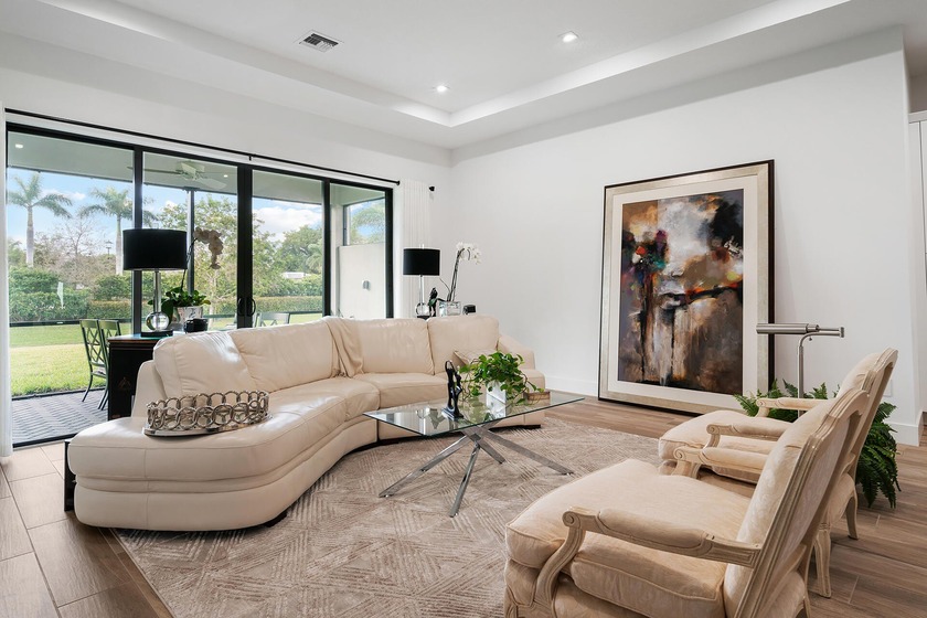 Sited on a prime lot with a large, elevated private west facing - Beach Home for sale in West Palm Beach, Florida on Beachhouse.com