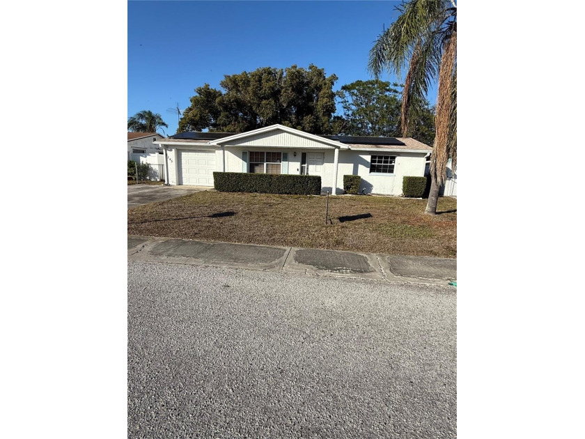 This home is full of potential and charm, perfectly situated - Beach Home for sale in Holiday, Florida on Beachhouse.com