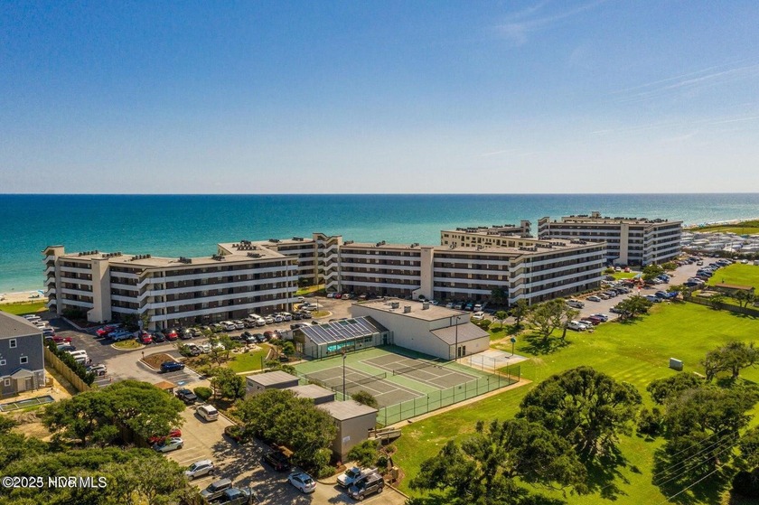 Step into relaxed coastal living with this freshly updated and - Beach Condo for sale in Indian Beach, North Carolina on Beachhouse.com