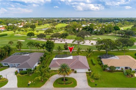 Welcome to your dream home in the prestigious Yacht & Country - Beach Home for sale in Stuart, Florida on Beachhouse.com