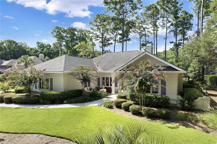 The setting on this 3 bedroom 3 bath golf course view on the 7th - Beach Home for sale in Bluffton, South Carolina on Beachhouse.com