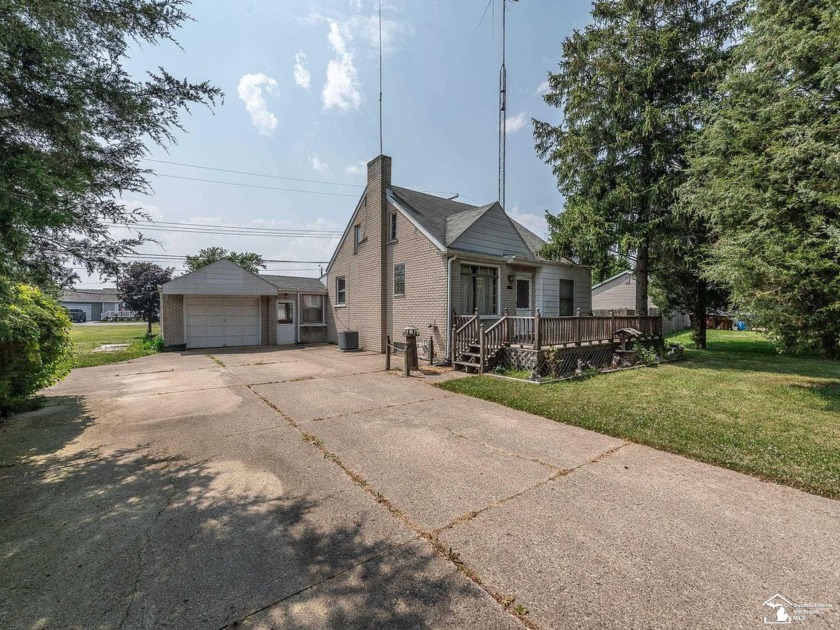 Charming Cape Cod Home in Brest Bay Subdivision comes with 10 - Beach Home for sale in Newport, Michigan on Beachhouse.com