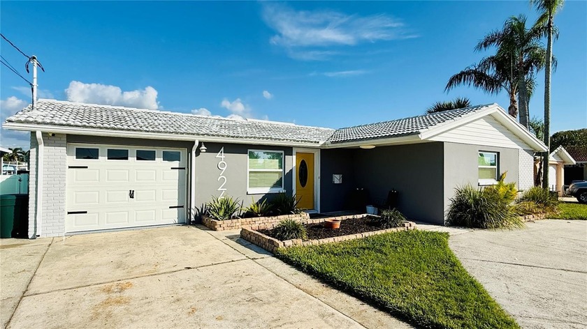 Welcome to 4926 Blue Heron Drive, where waterfront dreams meet a - Beach Home for sale in New Port Richey, Florida on Beachhouse.com