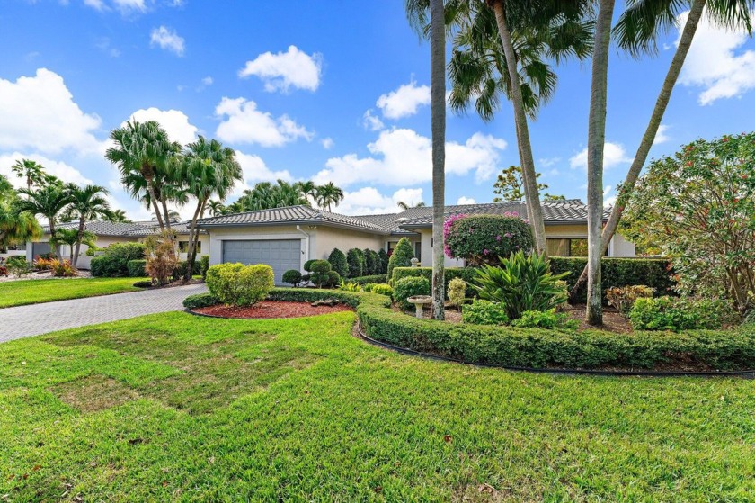 Enjoy golf and water views from this charming one-story - Beach Home for sale in Boynton Beach, Florida on Beachhouse.com