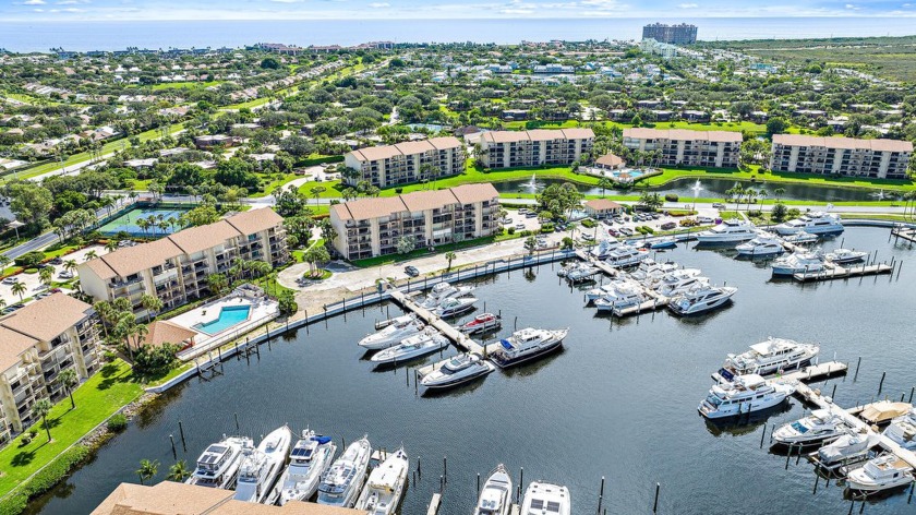 Nestled directly on the Intracoastal Waterway & surrounded by - Beach Condo for sale in Jupiter, Florida on Beachhouse.com