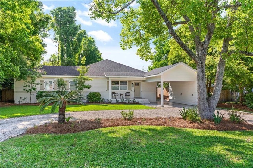 Nestled on a quiet street in the highly sought-after village - Beach Home for sale in Saint Simons, Georgia on Beachhouse.com