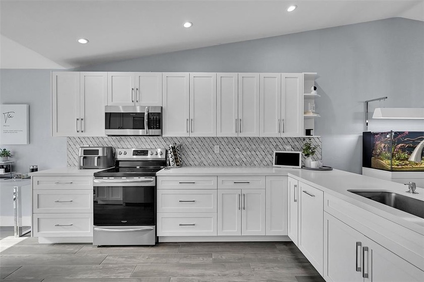 Beautifully renovated wood frame house. Three bedroom two bath - Beach Home for sale in Boynton Beach, Florida on Beachhouse.com