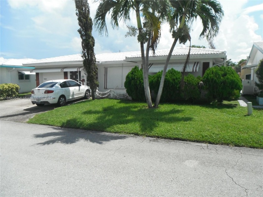 The house is in hazardous disrepair, requiring HazMat suits for - Beach Home for sale in Tamarac, Florida on Beachhouse.com