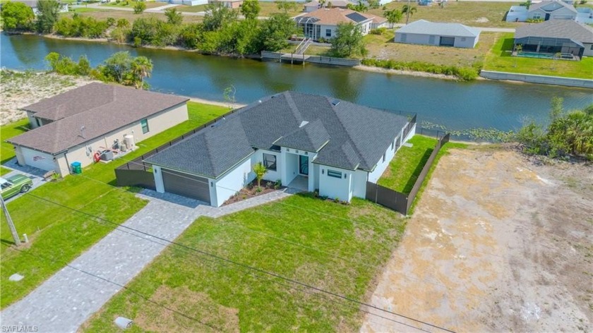 Beautifully new construction 3-bedroom + den, 2-bath waterfront - Beach Home for sale in Cape Coral, Florida on Beachhouse.com