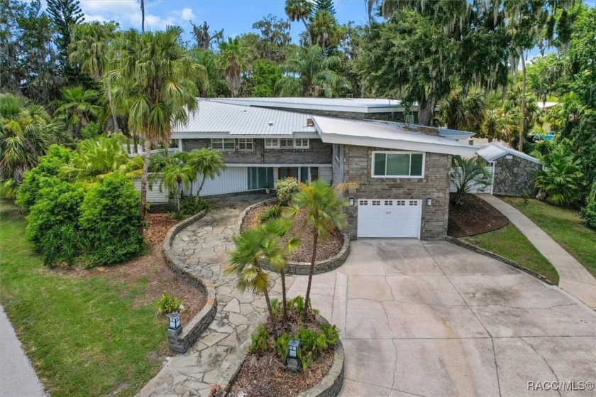 Step inside a home like no other! This Mid-Century Modern home - Beach Home for sale in Crystal River, Florida on Beachhouse.com
