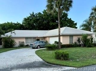 This concrete block home offers fantastic potential in the - Beach Home for sale in Hobe Sound, Florida on Beachhouse.com