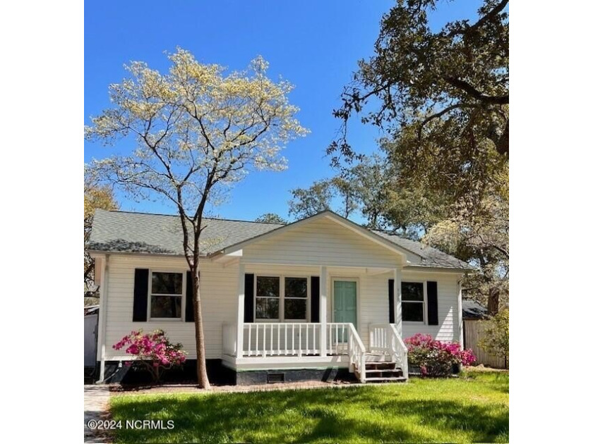 Newly renovated transitional home with large front porch, rear - Beach Home for sale in Oak Island, North Carolina on Beachhouse.com