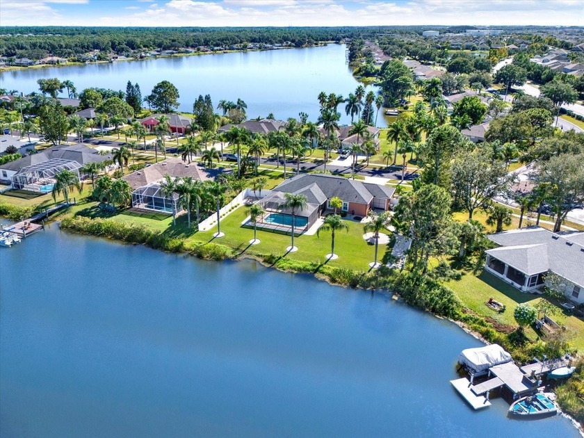 Discover 7602 Clair Wood Court, a rare lakefront retreat in the - Beach Home for sale in Apollo Beach, Florida on Beachhouse.com