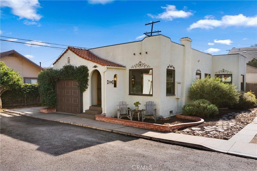 Nestled at the end of a peaceful cul-de-sac, this charming - Beach Home for sale in Long Beach, California on Beachhouse.com