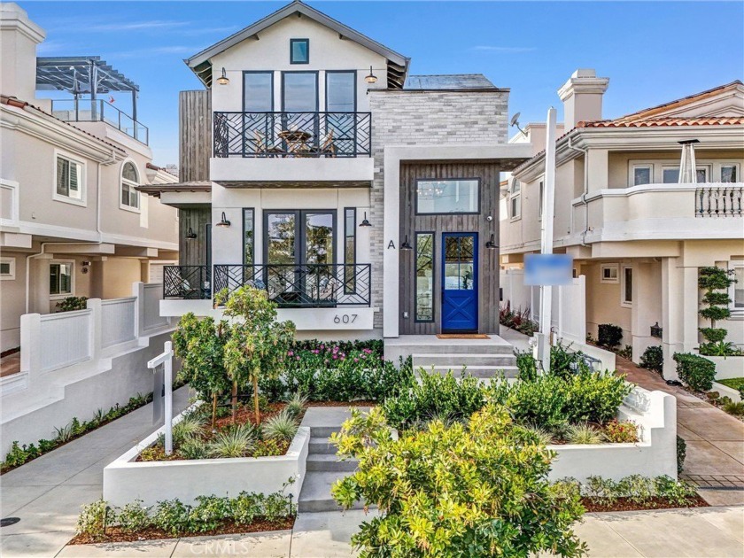 Step into a world of refined grace in this 4-bedroom 3 full  2 - Beach Townhome/Townhouse for sale in Redondo Beach, California on Beachhouse.com