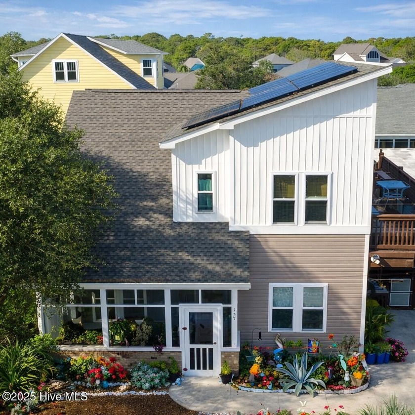 Modern coastal living meets private resort-like serenity at 137 - Beach Home for sale in Kure Beach, North Carolina on Beachhouse.com