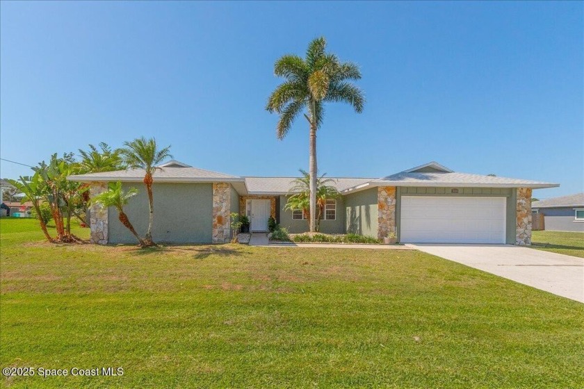 Welcome to this stunning 4-bedroom, 2-bath home in the highly - Beach Home for sale in Palm Bay, Florida on Beachhouse.com