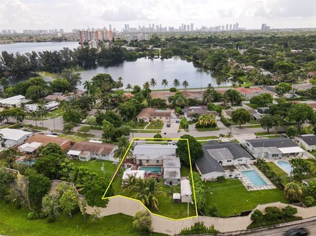 Nestled in the tranquil community of Pickwick Lake Estates, this - Beach Home for sale in North Miami Beach, Florida on Beachhouse.com