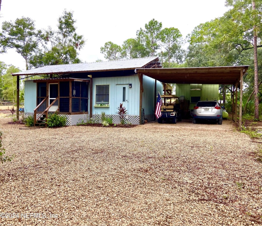 This delightful property offers 2 mobile homes nestled on a - Beach Home for sale in Steinhatchee, Florida on Beachhouse.com