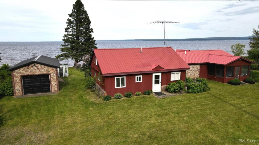 Here is a charming 3-bedroom, 2-bath cottage situated on the - Beach Home for sale in Baraga, Michigan on Beachhouse.com