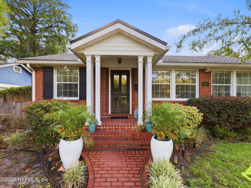 Tucked beneath mature trees on a quiet corner lot in Lakeshore - Beach Home for sale in Jacksonville, Florida on Beachhouse.com