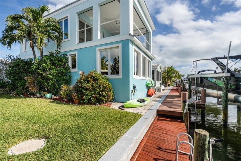 Experience tropical living at its finest in this waterfront - Beach Home for sale in Jensen Beach, Florida on Beachhouse.com