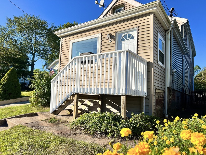 A charming home in a friendly neighborhood awaits you!  Located - Beach Home for sale in East Haven, Connecticut on Beachhouse.com