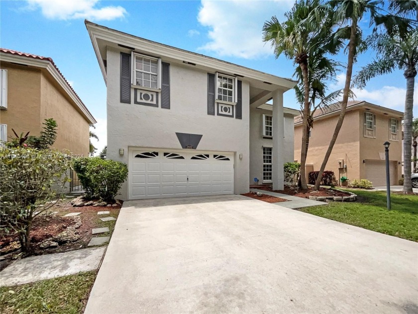 Discover this stunning 4-bedroom, 2.5-bath home in Hollywood - Beach Home for sale in Cooper City, Florida on Beachhouse.com